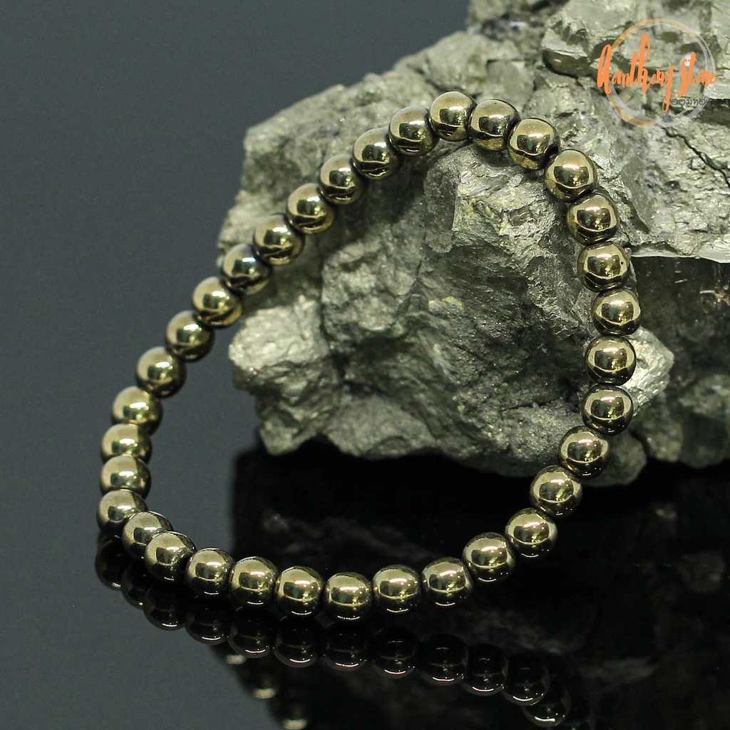แร่ไพไรต์ ขนาด 6 มิล Pyrite แต่งสี กำไลหินมงคล หินดูดทรัพย์ หินเรียกเงิน หินสี หินมงคล กำไลหิน ไพไรต์ หินสีทอง by.ออมทอง — ของมงคลหมวดการเงินและโชคลาภ