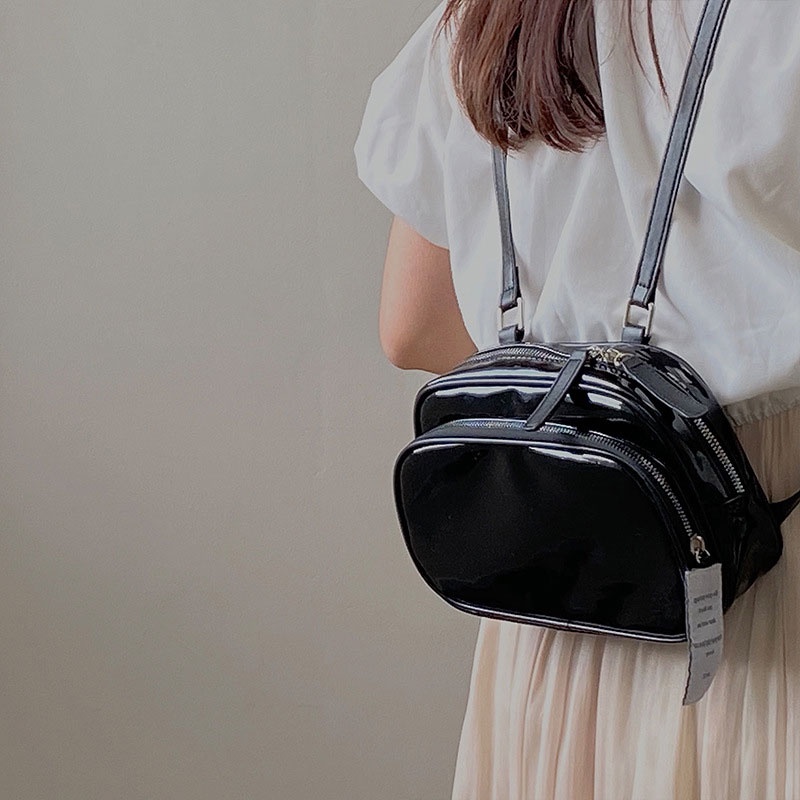 JUST STAR กระเป๋าเป้สะพายหลังผู้หญิง niche Square สีทึบน่ารักทุกการแข่งขันทุกวันลำลองสีดำกระเป๋านักเรียนขนาดเล็กกระเป๋าเป้สะพายหลังผู้หญิง