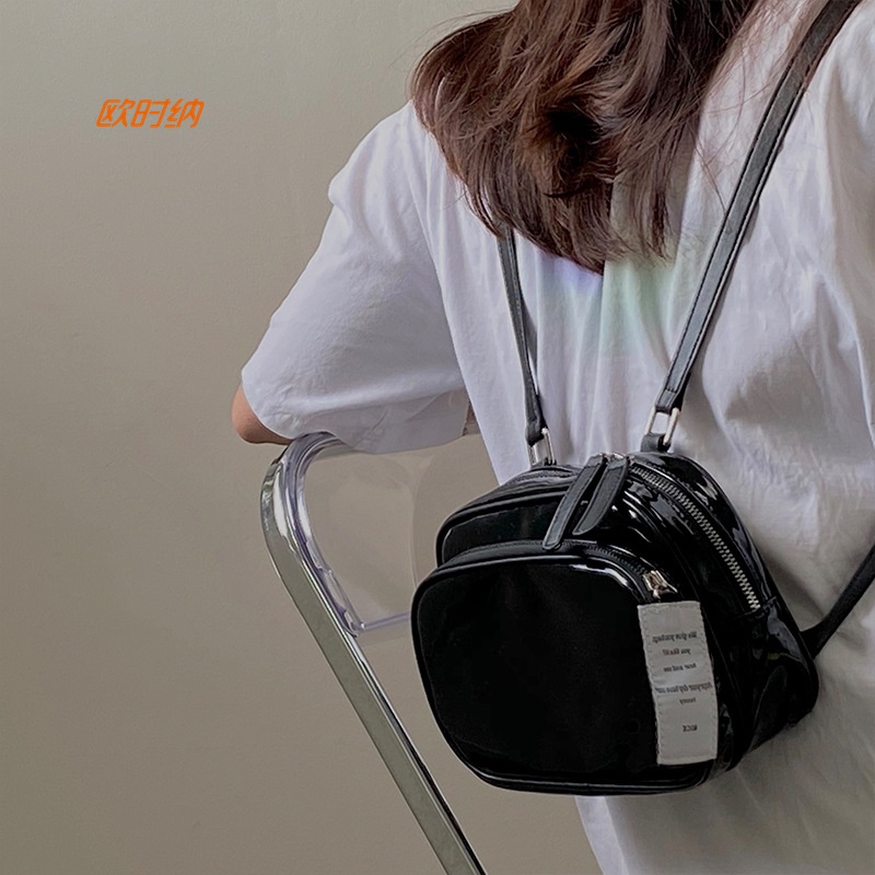 JUST STAR กระเป๋าเป้สะพายหลังผู้หญิง niche Square สีทึบน่ารักทุกการแข่งขันทุกวันลำลองสีดำกระเป๋านักเรียนขนาดเล็กกระเป๋าเป้สะพายหลังผู้หญิง