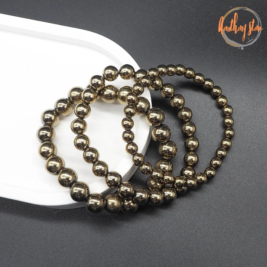แร่ไพไรต์ เพชรหน้าทั่ง Pyrite แต่งสี กำไลหินมงคล หินดูดทรัพย์ หินเรียกเงิน หินสี หินมงคล กำไลหิน ไพไรต์ หินสีทอง — ของมงคลหมวดการเงินและโชคลาภ