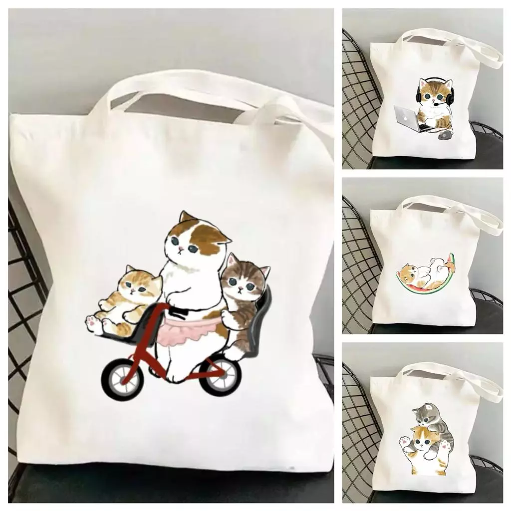 สินค้าใหม่: กระเป๋าผ้าทรงโท้ทลายแมวน่ารักสไตล์มินิมอล ความจุขนาดใหญ่ โดดเด่นด้วย