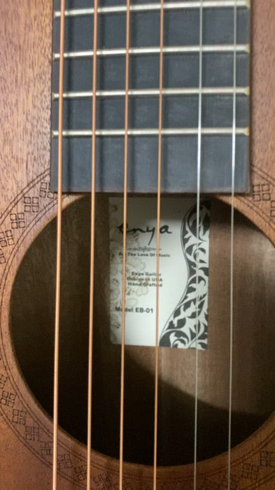 Enya EB-01 guitar acoustic-electric kiểu OM cỡ gọn, dễ mang, âm thanh trong sáng, rõ ràng, chơi thoải mái, vỏ mặt bằng gỗ thật (Solid Top), đã lắp ráp hoàn chỉnh