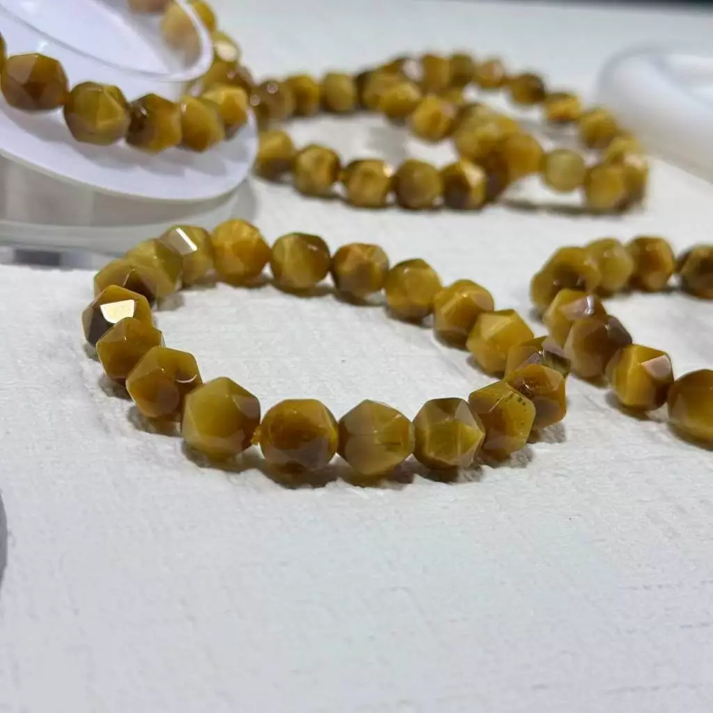 โกลด์ไทเกอร์อาย หินโกลเด้นไทเกอร์อาย ไทเกอร์อาย Gold Tiger Eyes เจียเหลี่ยม หินแท้ กำไลหิน หินนำโชค — ของมงคลหมวดเครื่องรางและวัตถุมงคล